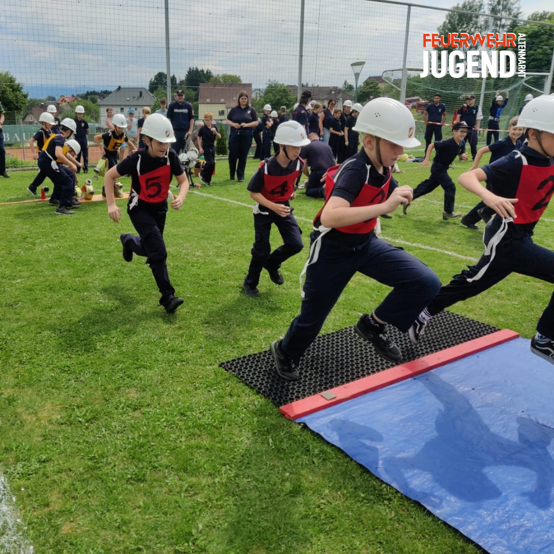 Abschnittsfeuerwehrjugendbewerb, Kinder springen über Wassergaben